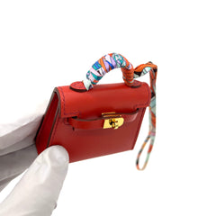 Hermes Kelly Twilly Bag Charm Fauve Palladium Tadelakt Leather Limited Edition Hermes Kelly Twilly Bag Charm Fauve Palladium Tadelakt Leather Limited Edition