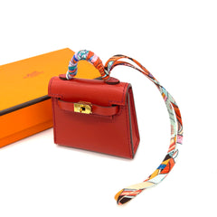 Hermes Kelly Twilly Bag Charm Fauve Palladium Tadelakt Leather Limited Edition Hermes Kelly Twilly Bag Charm Fauve Palladium Tadelakt Leather Limited Edition