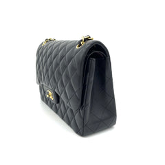 CHANEL Lambskin Quilted Jumbo Double Flap in Black and Gold