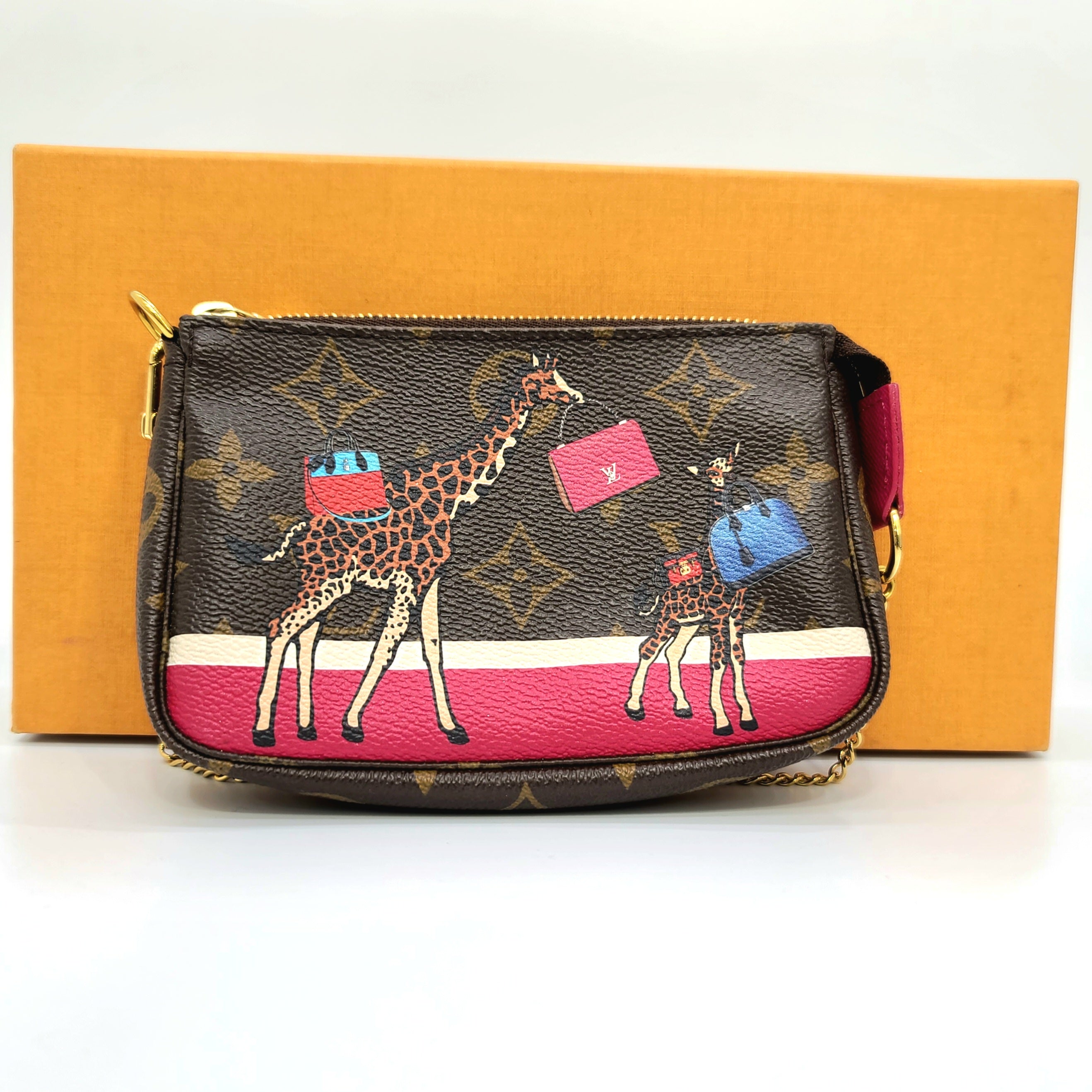 Louis Vuitton mini pochette accessoires. On website search for