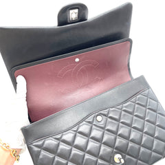 CHANEL Lambskin Quilted Maxi Double Flap Bag – Black