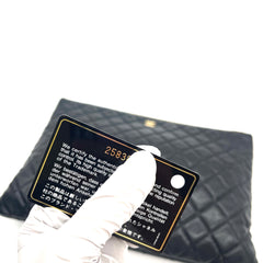 CHANEL O Case Large Clutch in Black Quilted Caviar Leather with Gold-Tone Hardware