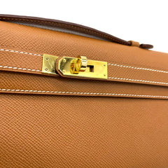 Hermes Gold Swift Leather Kelly Cut Clutch