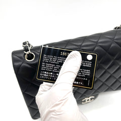 CHANEL Lambskin Quilted Maxi Double Flap Bag – Black