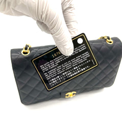 CHANEL Caviar Quilted Maxi Double Flap Black 2012