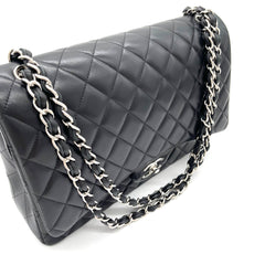 CHANEL Lambskin Quilted Maxi Double Flap Bag – Black