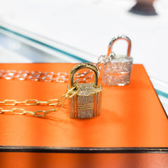 Louis Vuitton Padlock Earrings, Luxury, Accessories on Carousell