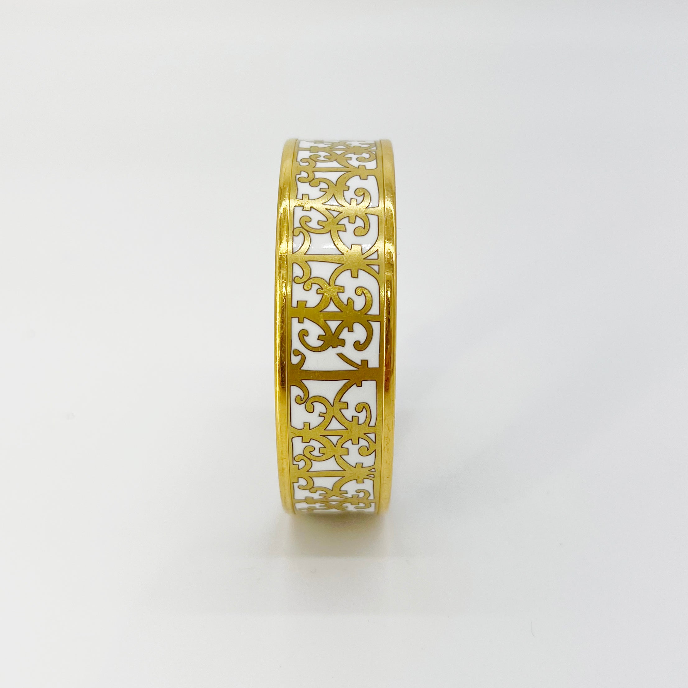 Guaranteed Authentic HERMÈS Balcons du Guadalquivir Printed Wide  Enamel Bracelet Gold Plated