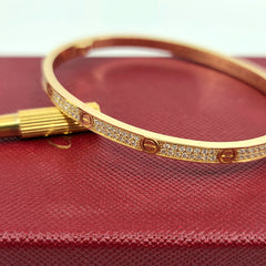Serial # HSE526 LOVE BRACELET, SMALL MODEL, PAVED  Yellow gold, diamonds Official Cariter price $27,400.00 + sales tax