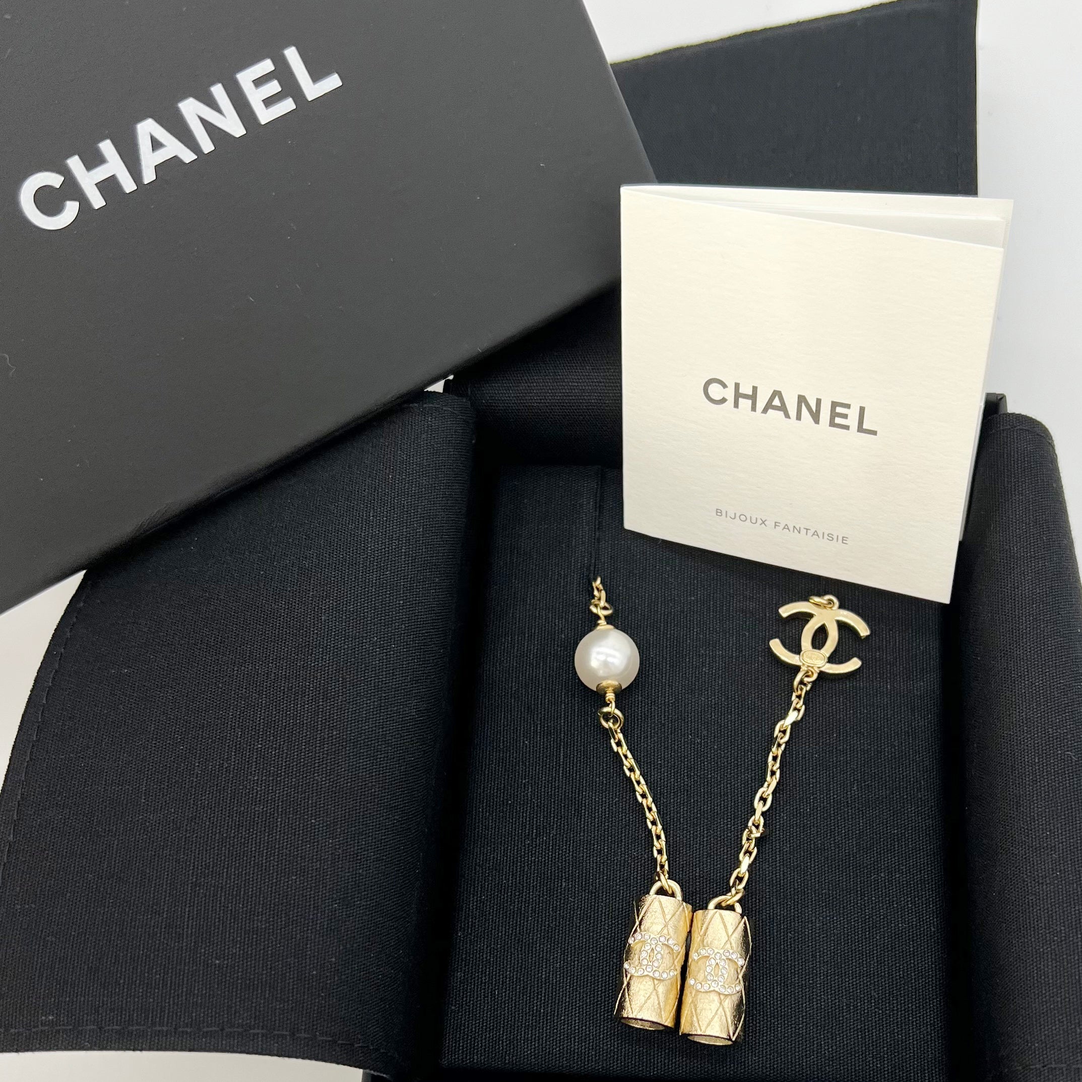 The New Chanel AirPods Case Doubles As A Fashionable Pearl Necklace