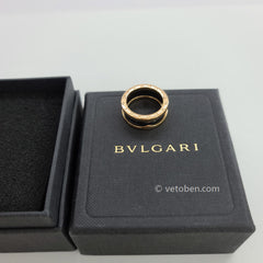 B.zero1 four-band ring with two 18 kt rose gold loops and a black ceramic spiral.