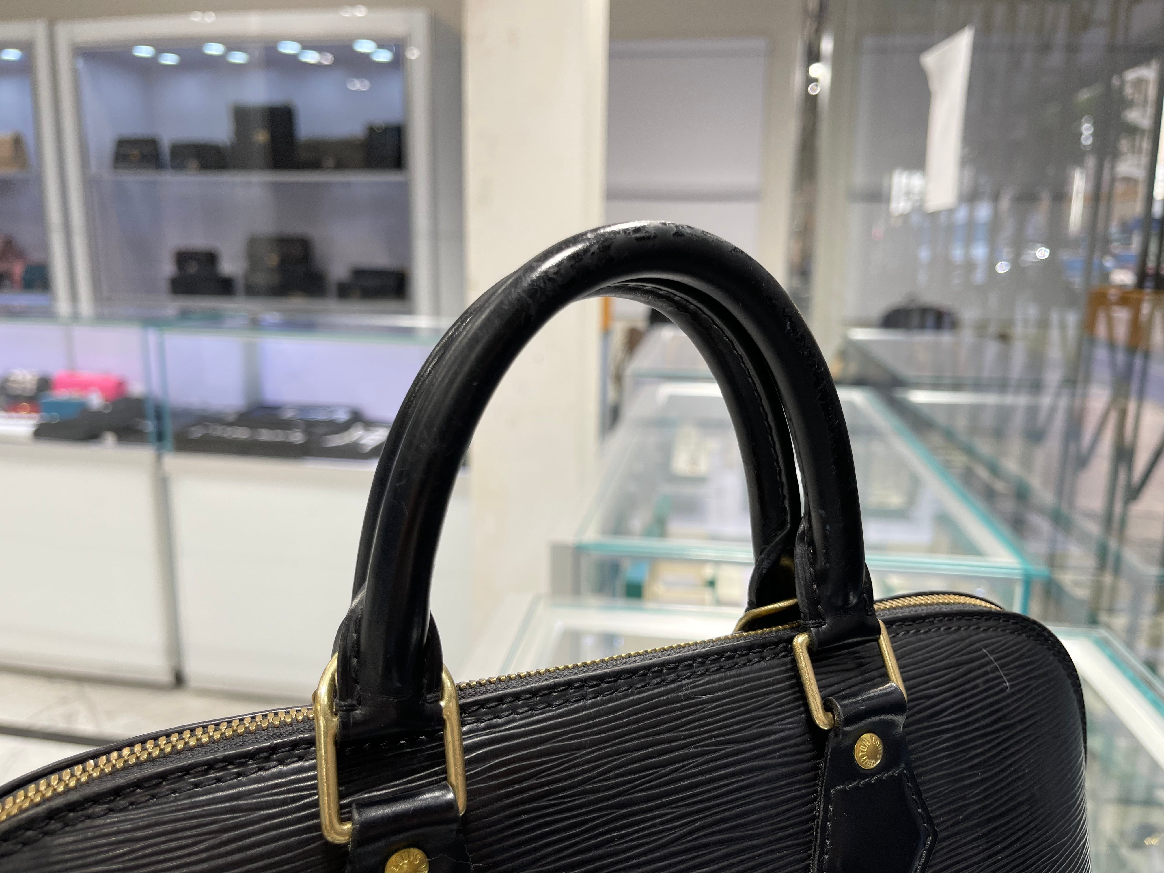 louis vuitton black alma pm