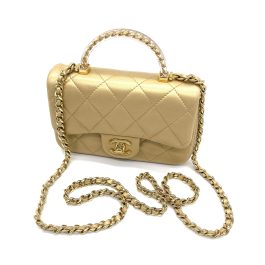 CHANEL
Metallic Lambskin Resin Quilted Top Handle Mini Flap Gold