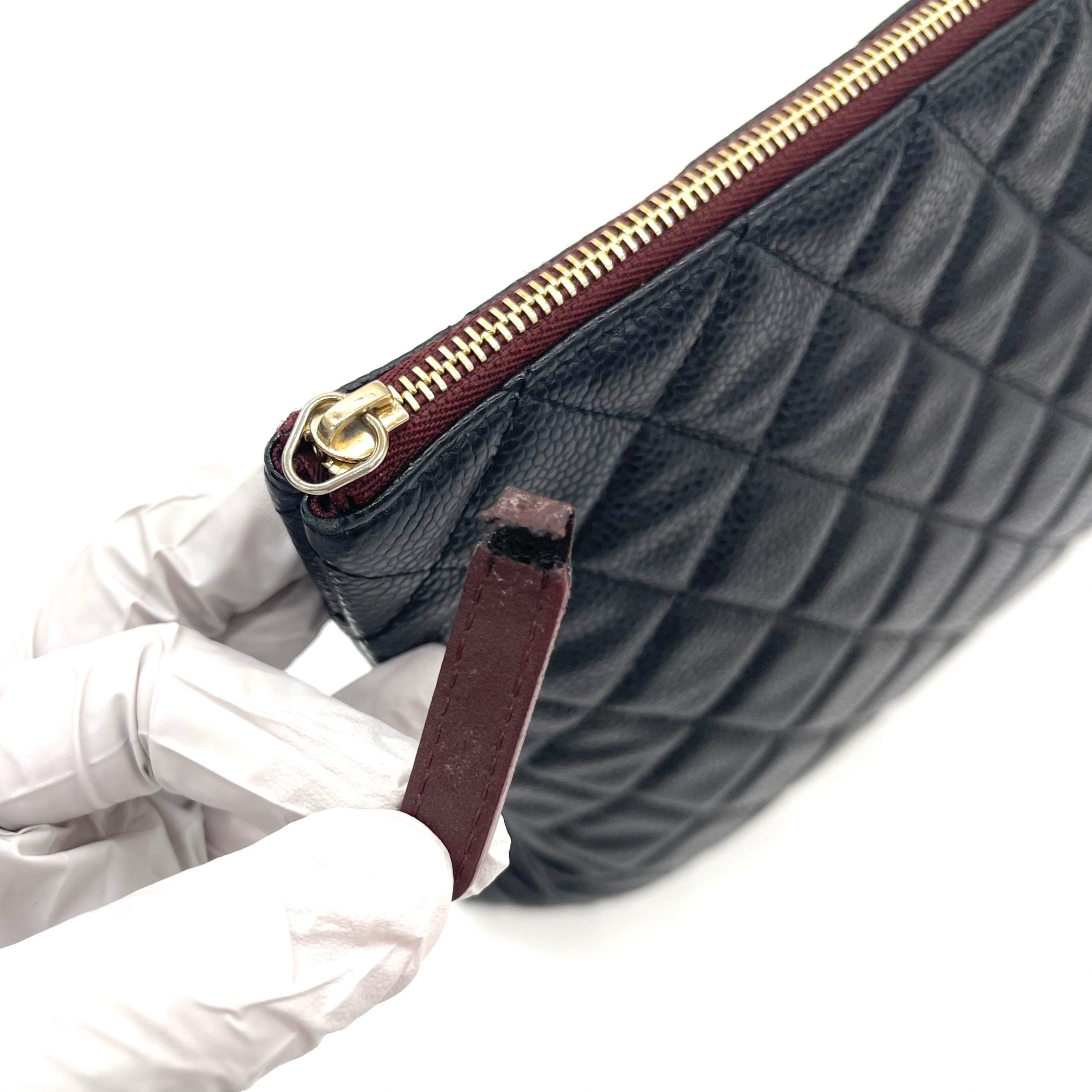 CHANEL O Case Large Clutch in Black Quilted Caviar Leather with Gold-Tone Hardware