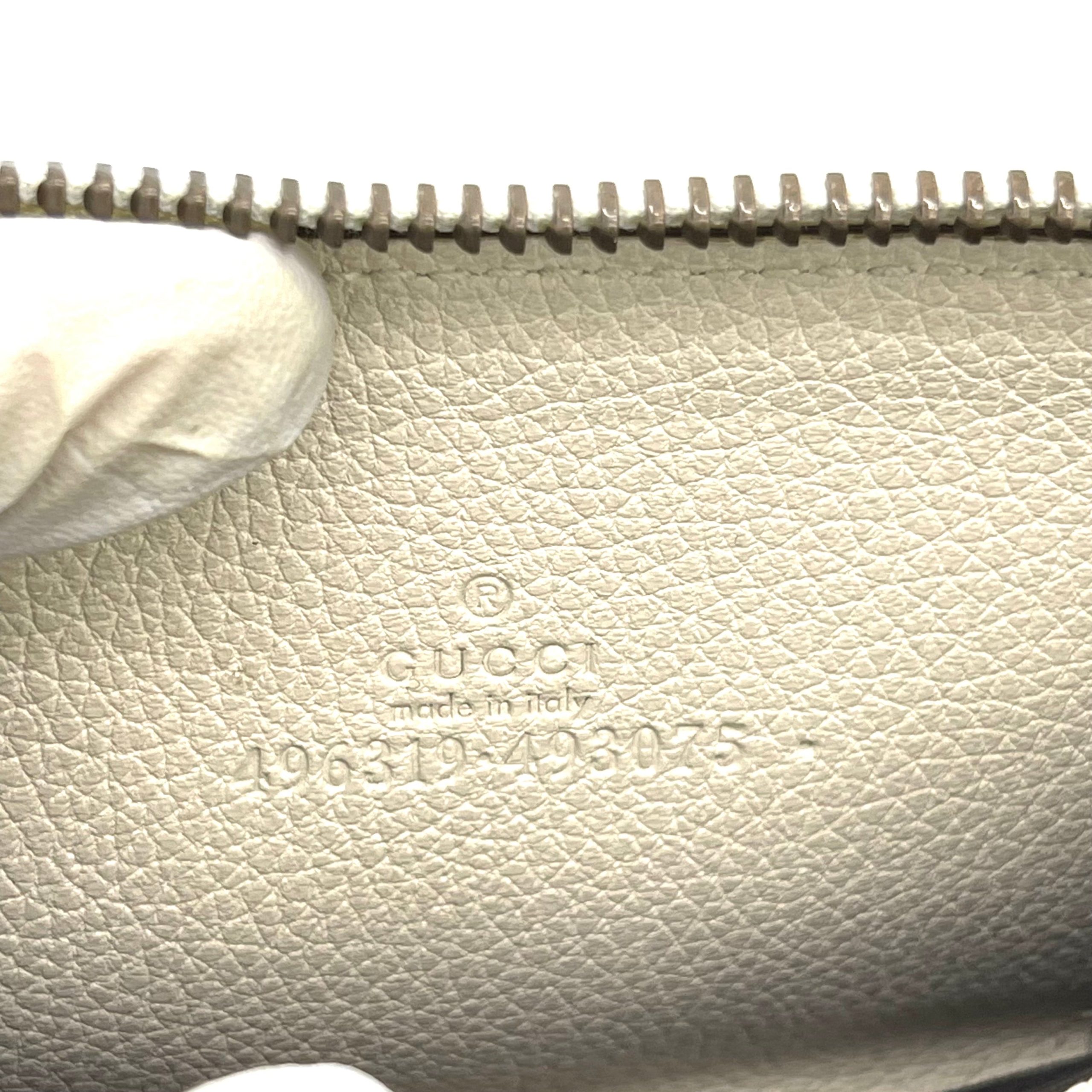 GUCCI
Calfskin Logo Zip Around Card Case White