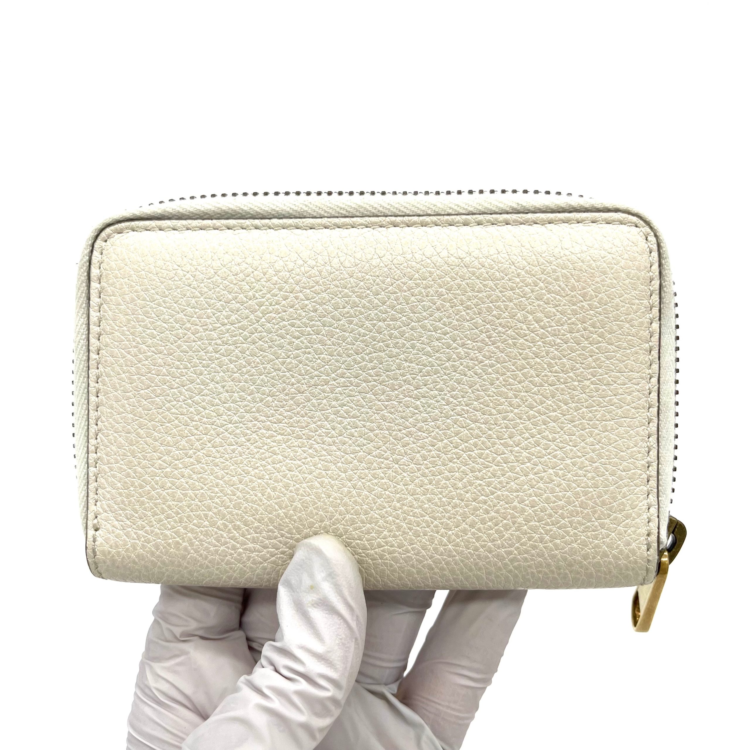 GUCCI
Calfskin Logo Zip Around Card Case White