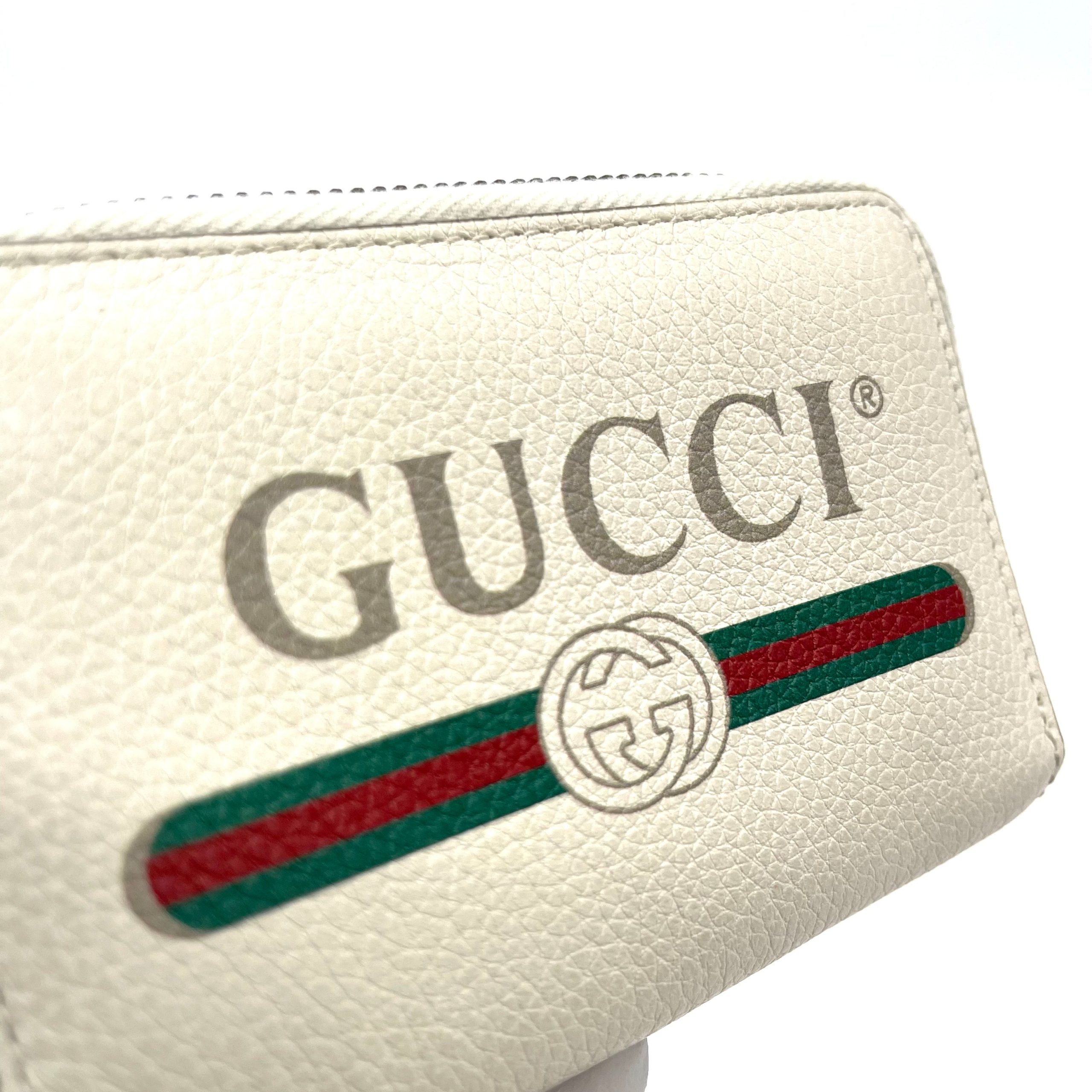 GUCCI
Calfskin Logo Zip Around Card Case White