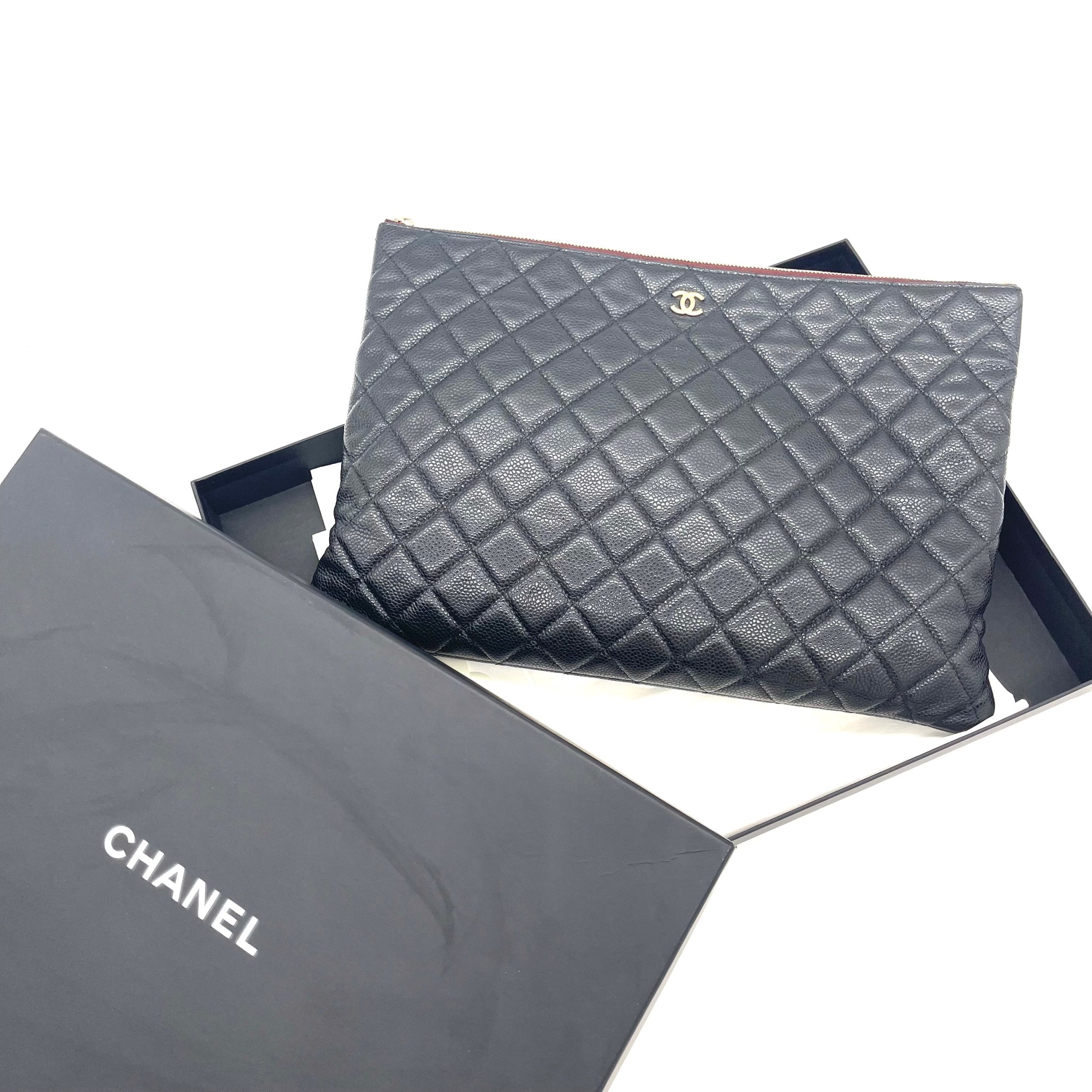 CHANEL O Case Large Clutch in Black Quilted Caviar Leather with Gold-Tone Hardware