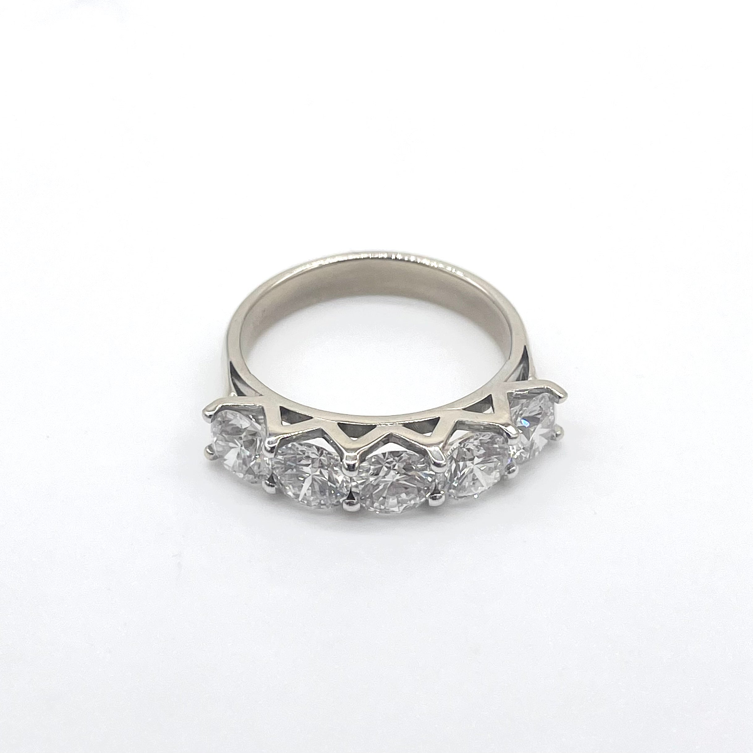 5 Diamonds & 18k White Gold Ring