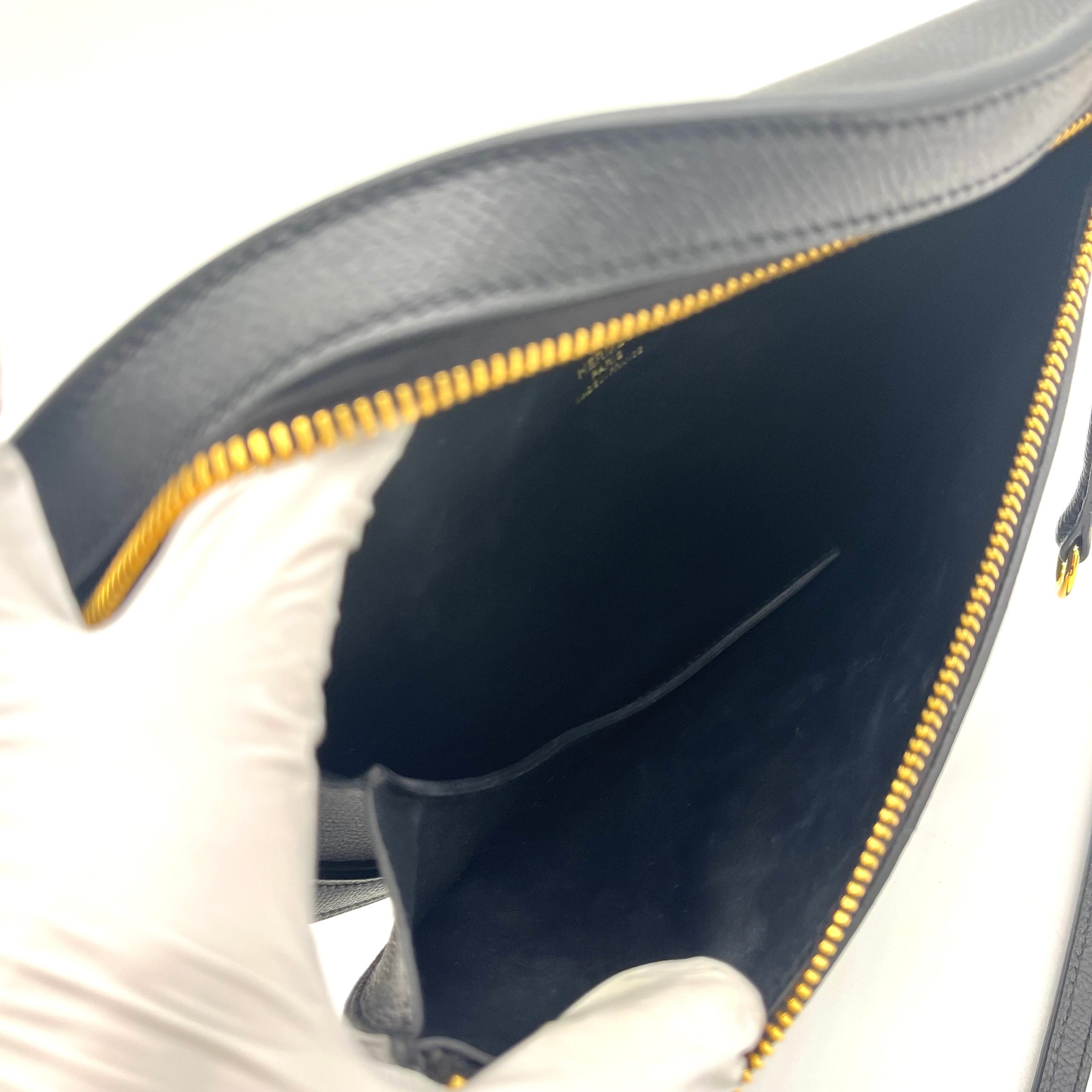 Hermès Noir Yellow gold plated Petite Course bag