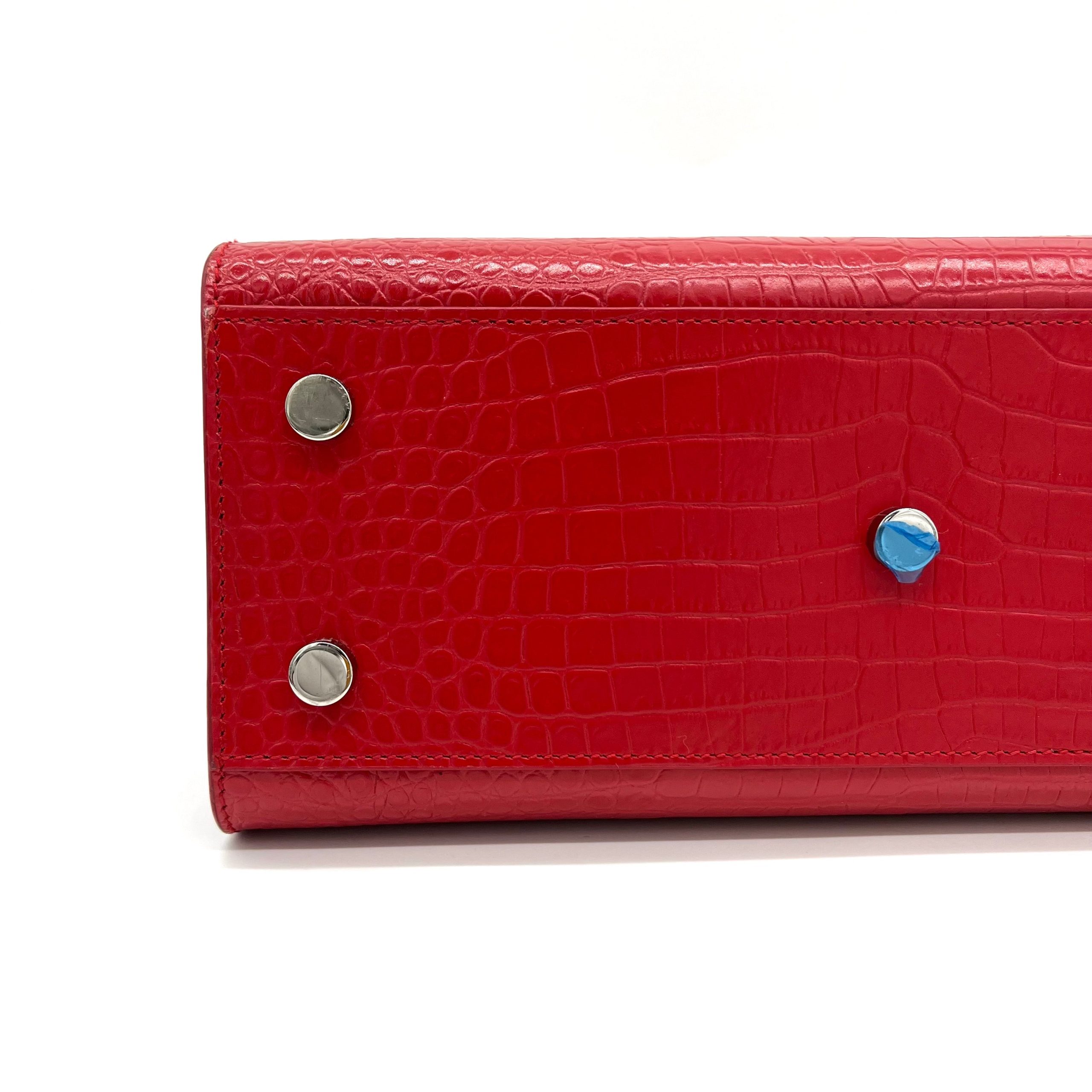 Saint Laurent small sac de jour top handle bag in matte embossed crocodile Leather Red