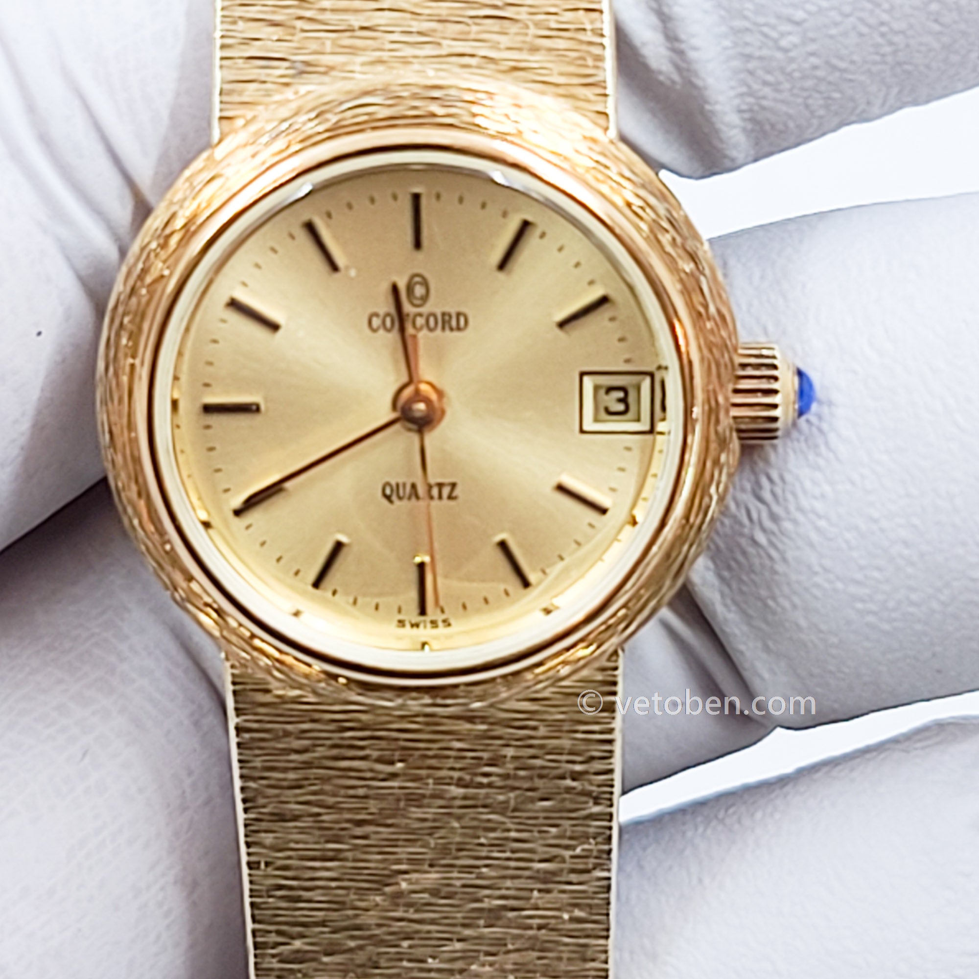 All 14k gold Concord watch