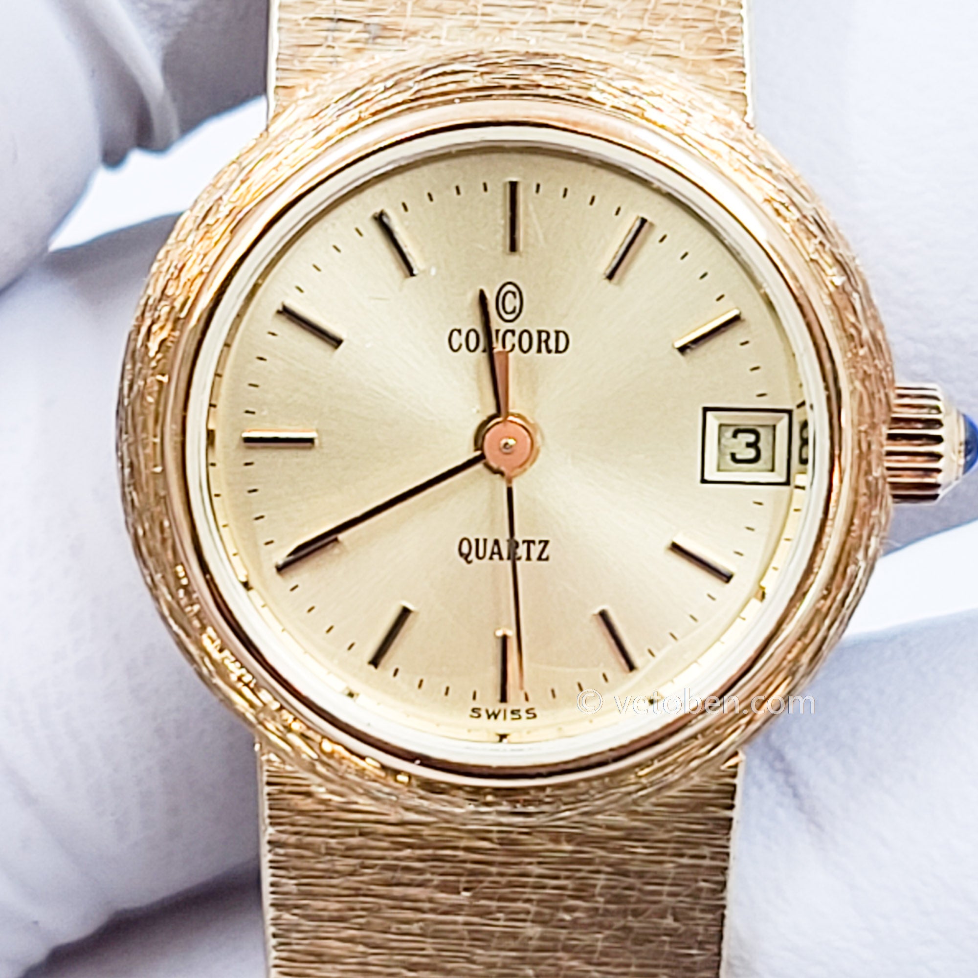 All 14k gold Concord watch